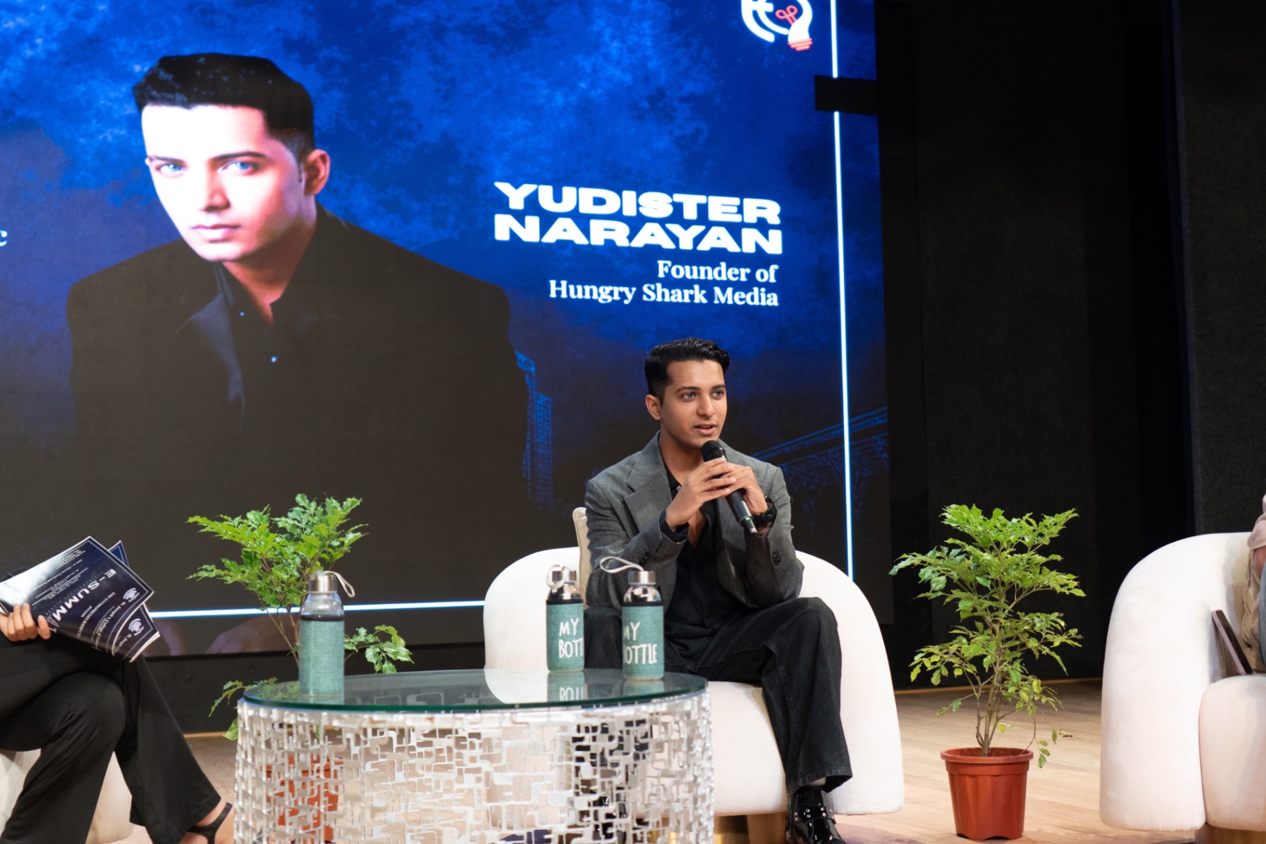 Yudister Narayan speaking on a panel